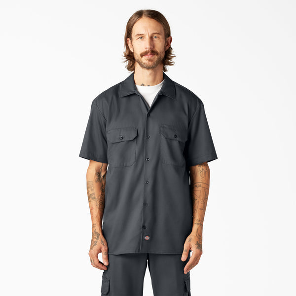 Man wearing a Dickies charcoal short-sleeve button-up shirt 