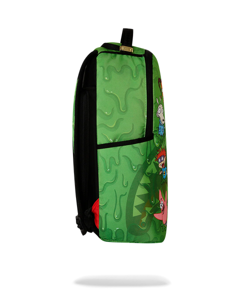 Sprayground 90s Nickelodeon Slime Drip backpack with cartoon character designs on a green background