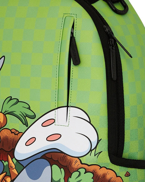 Sprayground Looney Tunes Backpack with cartoon character design on a green background 