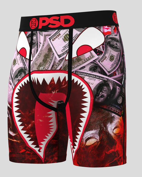 PSD Shark-themed underwear with money print and PSD branding on a gray background